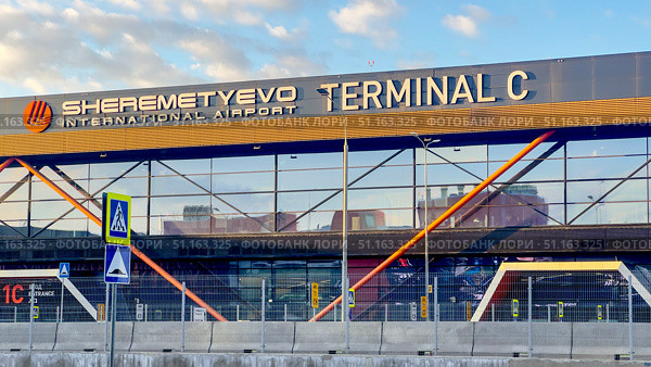 Moscow, Russia, August 20, 2025: Sheremetyevo Airport Terminal C. Редакционное фото, фотограф Igor Skripachev / Фотобанк Лори