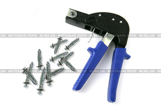 Nail gun. Стоковое фото, агентство Ingram Publishing / Фотобанк Лори