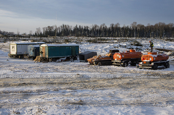 Нефтегазовое месторождение. Вырубка леса. База вахтовиков. Gas field. Deforestation. Base of shift workers. Стоковое фото, фотограф Евгений Романов / Фотобанк Лори