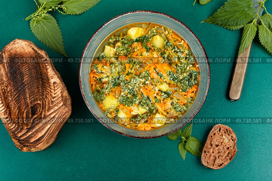 Nettle soup made from young of nettles. Healthy vegan nettle soup. Стоковое фото, агентство Ingram Publishing / Фотобанк Лори
