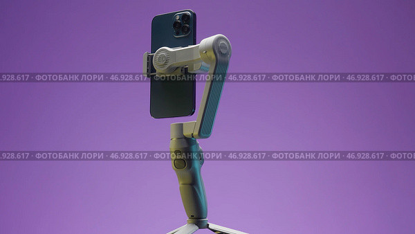 New professional phone with three cameras rotating with stabilizer on lilac wall background. Редакционная иллюстрация, иллюстратор David Kashakhi / Фотобанк Лори