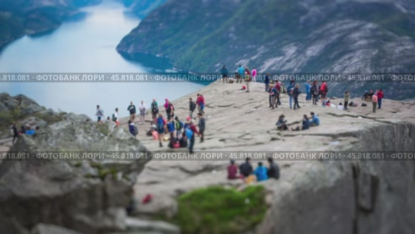 NORWAY- June 22, 2015: Preikestolen or Prekestolen, also known by the English translations of Preacher's Pulpit or Pulpit Rock, is a famous tourist attraction in Forsand, Ryfylke, Norway (2018 год). Стоковое видео, видеограф Андрей Армягов / Фотобанк Лори