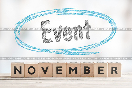 November event sign with wooden blocks on a stage. Стоковое фото, агентство Ingram Publishing / Фотобанк Лори