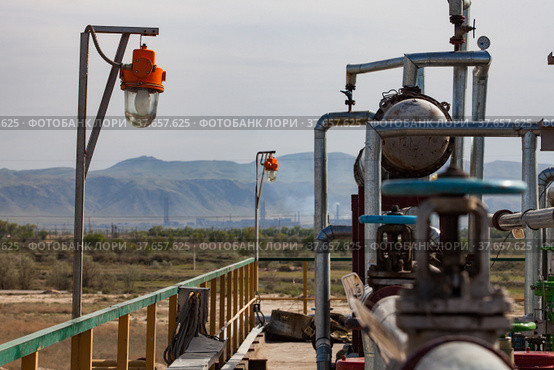 Oil refinery plant on sky and mountain background. Kazakhstan, Taraz city. Стоковое фото, фотограф Alexey Rezvykh / Фотобанк Лори