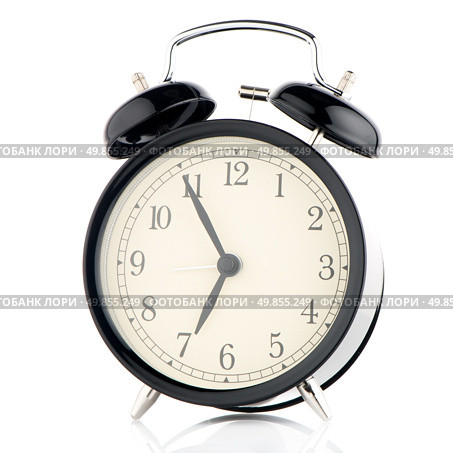 Old fashioned alarm clock on white background. Стоковое фото, агентство Ingram Publishing / Фотобанк Лори