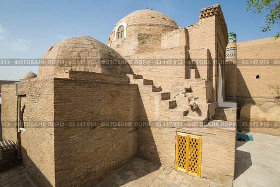 Old houses in Itchan Kala, the walled inner town of the city of Khiva. Стоковое фото, фотограф Юлия Белоусова / Фотобанк Лори