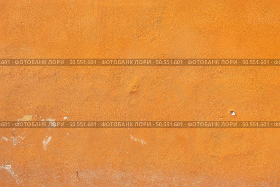 Old orange wall texture in Pisa, Italy. Wall texture from Pisa. Стоковое фото, агентство Ingram Publishing / Фотобанк Лори