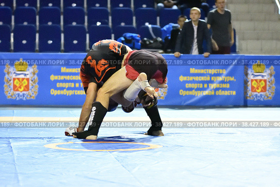 Orenburg, Russia - October 5, 2019: Men compete in Pankration wrestling. Редакционное фото, фотограф Владимир Галкин / Фотобанк Лори