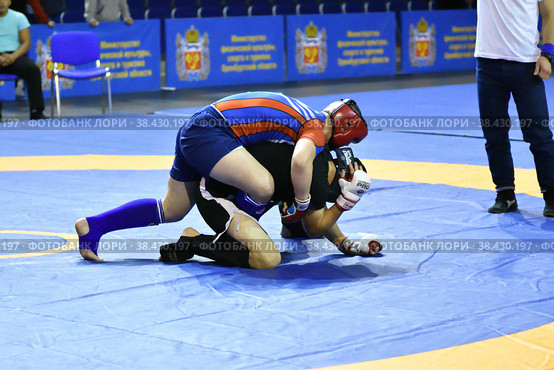 Orenburg, Russia - October 5, 2019: Men compete in Pankration wrestling. Редакционное фото, фотограф Владимир Галкин / Фотобанк Лори