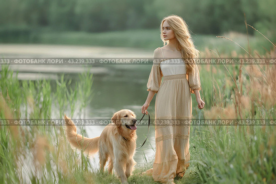 Owner and happy dog on the grass walking in summer day. Стоковое AI-изображение, AI-художник Ирина Ручушкина / Фотобанк Лори