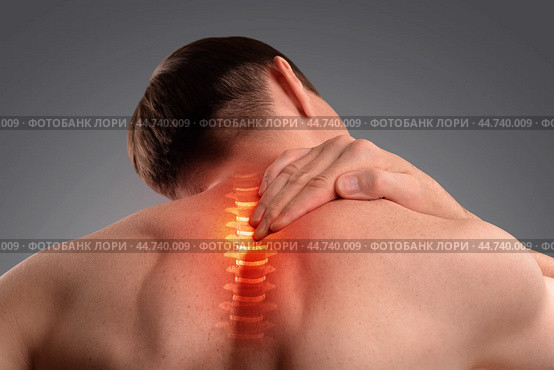 Pain in the cervical spine. Inflammation of the vertebra. Стоковое фото, фотограф Дмитрий Кобзев / Фотобанк Лори
