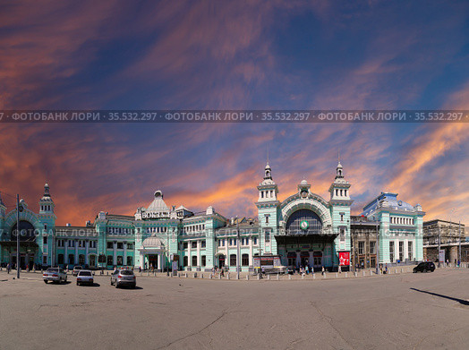 Panorama of the Belorusskiy railway station (written in Russian)-- is one of the nine main railway stations in Moscow, Russia. It was opened in 1870 and rebuilt in its current form in 1907-1912 (2016 год). Редакционное фото, фотограф Владимир Журавлев / Фотобанк Лори