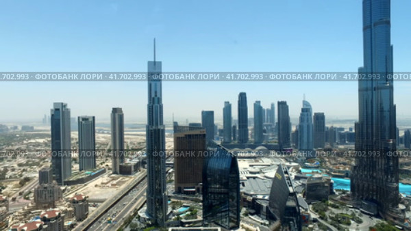 Panoramic aerial view of urban modern business district of Dubai city, UAE (2023 год). Стоковое видео, видеограф Aleksandr Golubev / Фотобанк Лори