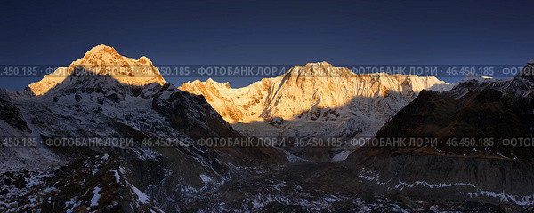 Panoramic view of the Himalaya mountains at sunrise. Annapurna South and Annapurna I seen from base camp. (2012 год). Стоковое фото, фотограф Анна Ефимова / Фотобанк Лори