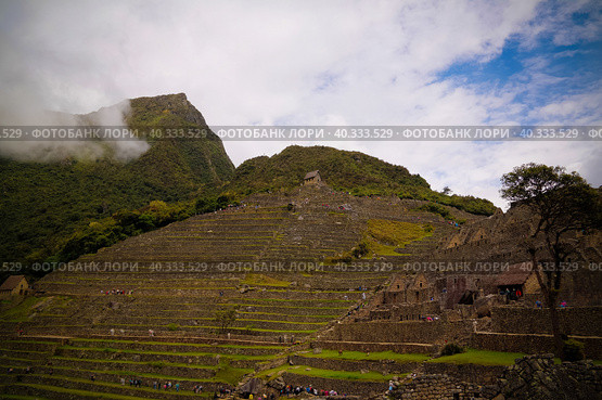 Panoramic view to Machu Picchu archaeological site with Polygonal masonry, Cuzco, Peru (2018 год). Стоковое фото, фотограф Сергей Майоров / Фотобанк Лори