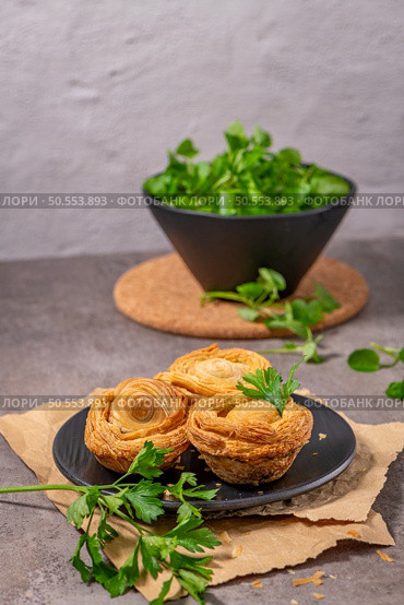 Pastries filled with meat, traditionally baked in black clay molds both from the region on Vila Real, Portugal. Стоковое фото, агентство Ingram Publishing / Фотобанк Лори