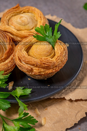 Pastries filled with meat, traditionally baked in black clay molds both from the region on Vila Real, Portugal. Стоковое фото, агентство Ingram Publishing / Фотобанк Лори