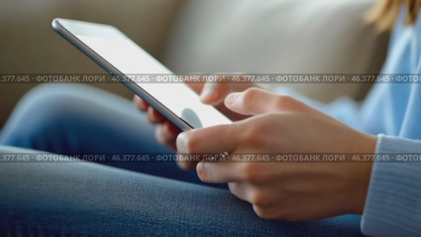 Person using a tablet device. Digital interactions and activities. Man holding a pad. Remote learning, social distance working, ordering buying online, reading e book. Close-Up view, Modern Technology. Стоковое AI-видео, аниматор Марина Демидюк / Фотобанк Лори