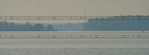 Photography of the Istra water Reservoir in day time. Russian holidays concept. Rainy overcast day. Beautiful landscape. August weekend. Стоковое фото, фотограф YuryKara / Фотобанк Лори