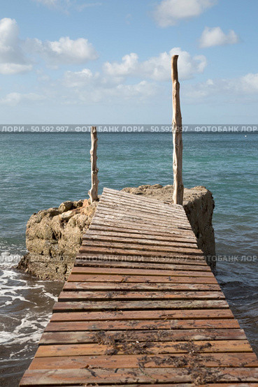 Pier at Cala Hort Cove, Ibiza; Spain. Стоковое фото, агентство Ingram Publishing / Фотобанк Лори