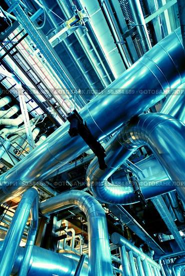 Pipes, tubes, machinery and steam turbine at a power plant                 . Стоковое фото, агентство Ingram Publishing / Фотобанк Лори