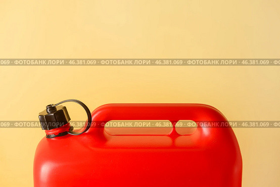 Plastic jerrycan on color background. Стоковое фото, фотограф Pixel_shot / Фотобанк Лори