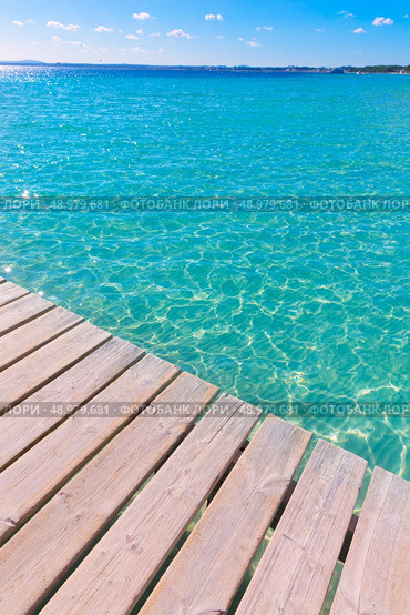 Platja de Alcudia beach pier in Mallorca Majorca at Balearic islands of Spain. Стоковое фото, агентство Ingram Publishing / Фотобанк Лори