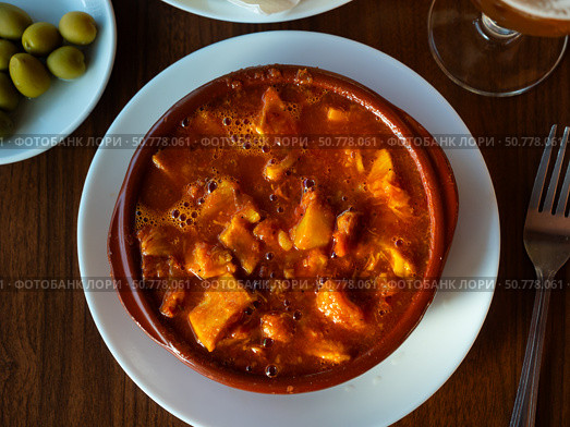 Portion of stewed tripe is cooked in plate - stomach of cattle. Стоковое фото, фотограф Яков Филимонов / Фотобанк Лори
