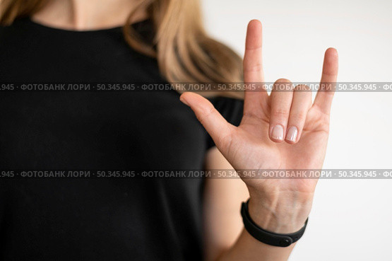 portrait interpreter teaching sign language. Стоковое фото, агентство Ingram Publishing / Фотобанк Лори