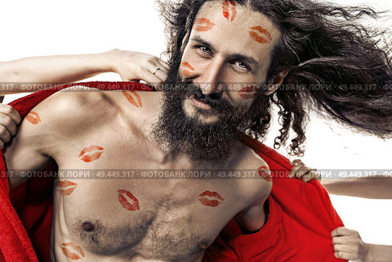 Portrait of a skinny handsome man taken by lots of women. Стоковое фото, агентство Ingram Publishing / Фотобанк Лори