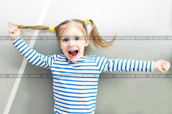 Portrait of funny happy little girl. Стоковое фото, фотограф ivolodina / Фотобанк Лори