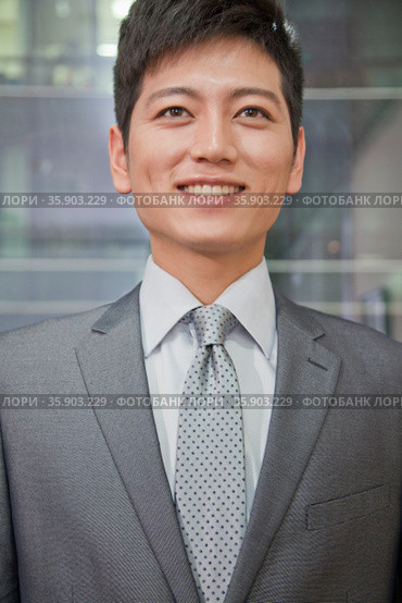 Portrait of Smiling Businessman. Стоковое фото, агентство Ingram Publishing / Фотобанк Лори
