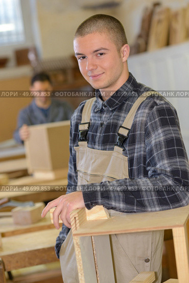 portrait of young carpentry apprentice. Стоковое фото, агентство Ingram Publishing / Фотобанк Лори