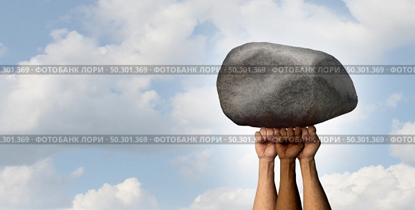 Power of protest concept and powerful human rights metaphor as diverse protester fists lifting up a huge rock. Стоковое фото, агентство Ingram Publishing / Фотобанк Лори