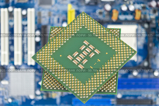 Процессор на материнской плате. Central Processing Unit CPU on the motherboard. Стоковое фото, фотограф Татьяна Д / Фотобанк Лори