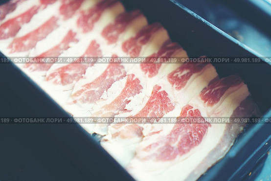 raw food, beef Sliced. Стоковое фото, агентство Ingram Publishing / Фотобанк Лори