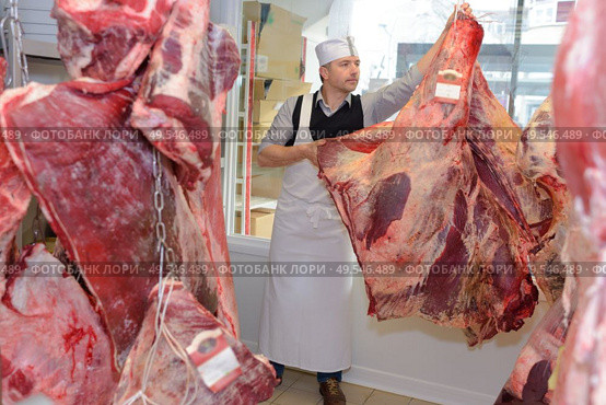 raw meat on hook. Стоковое фото, агентство Ingram Publishing / Фотобанк Лори