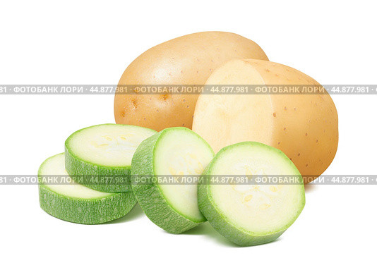 Raw potato and sliced green squash isolated on white background. Стоковое фото, фотограф Катерина Ковалева / Фотобанк Лори