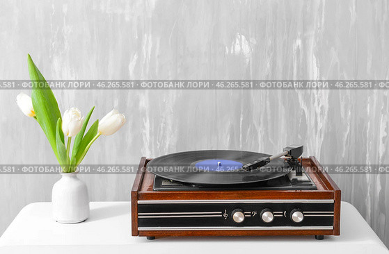 Record player with vinyl disc on table. Стоковое фото, фотограф Pixel_shot / Фотобанк Лори