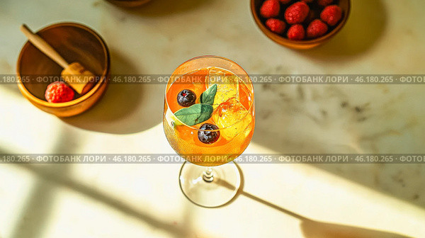 Refreshing berry spritzer with sparkling wine garnished with fresh berries and mint. Стоковое AI-изображение, AI-художник Евгения Пархоменко / Фотобанк Лори