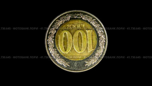 Реверс монеты 100 леков, Албания. Rotating reverse of Albania coin 100 leke 2000 with inscription meaning 100 leks. Isolated in black background. Стоковая анимация, аниматор Александр Кузнецов / Фотобанк Лори