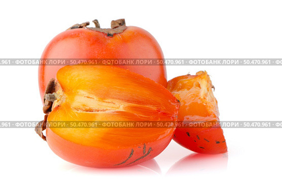Ripe persimmons on white background. Стоковое фото, агентство Ingram Publishing / Фотобанк Лори