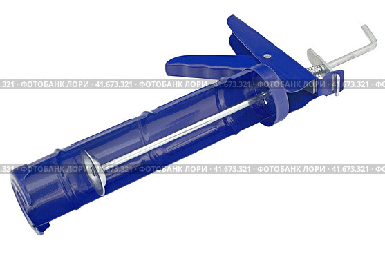 Ручной монтажный пистолет для клея на белом фоне. Silicone glue gun, isolated on white background. Стоковое фото, фотограф Татьяна Д / Фотобанк Лори