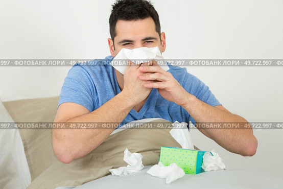 runny nose nasal congestion in men. Стоковое фото, агентство Ingram Publishing / Фотобанк Лори