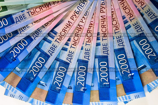 Russian money banknotes in nominal value of two thousand. New tickets of the bank of Russia. Russian money. Стоковое фото, фотограф Леонид Еремейчук / Фотобанк Лори