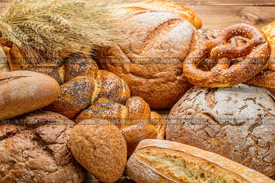 Rye bread in a wicker basket. Sliced bread, napkin.. Rye bread in a wicker basket. Стоковое фото, агентство Ingram Publishing / Фотобанк Лори