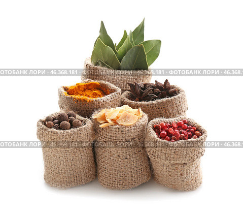 Sacking bags with various spices on white background. Стоковое фото, фотограф Pixel_shot / Фотобанк Лори