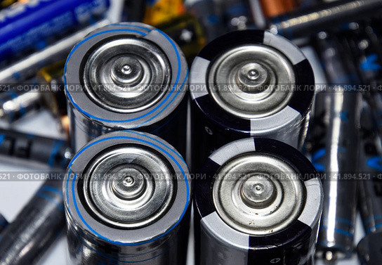 Salt and alkaline batteries, source of energy for portable technology. AAA and AA batteries. Стоковое фото, фотограф Леонид Еремейчук / Фотобанк Лори