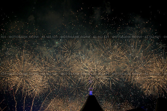 Salute fireworks gold. Holiday background with text space. Background for wallpaper photos. Стоковое фото, фотограф Валерий Леонидович / Фотобанк Лори