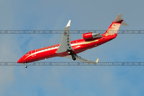 Самолет Bombardier CRJ-200ER CRJ-200ER (VQ-BFI ) авиакомпании «Руслайн» в полете (2016 год). Редакционное фото, фотограф Виктор Карасев / Фотобанк Лори